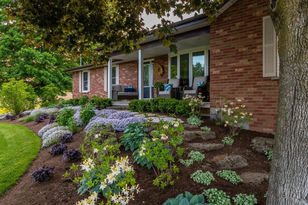 Creative Concept Landscapes Residential Landscaping Services showing the benefits of mulch