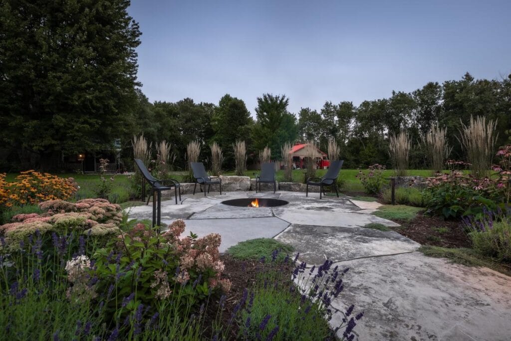 Backyard patio with garden edges and outdoor living space