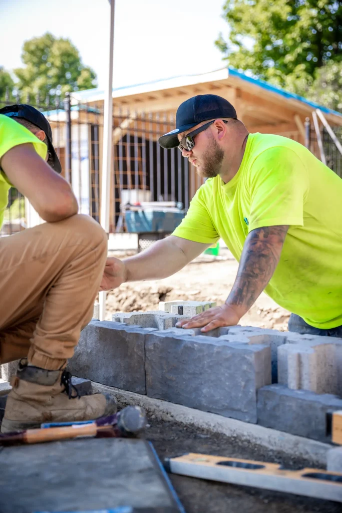Creative Concepts Landscapes employee working on a landscape construction project in Oakville Ontario