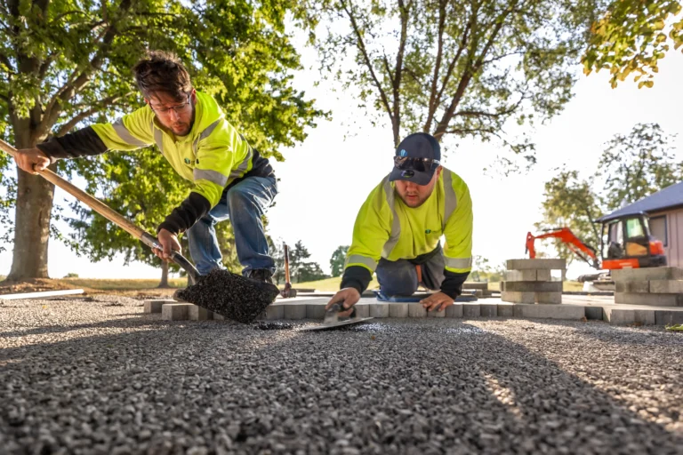 Creative Concepts Landscapes employee working on a landscape construction project in Oakville Ontario