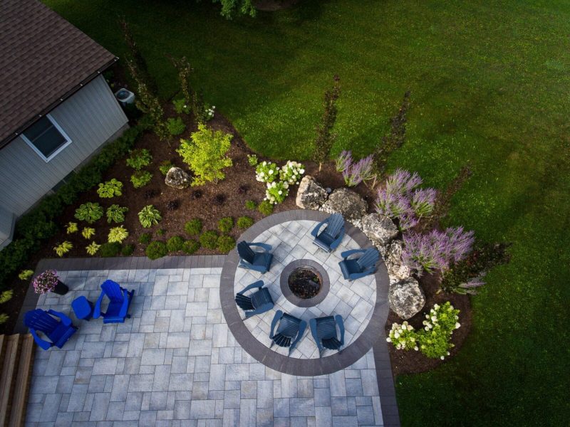 Landscaping Project in Flamborough, Ontario showing a Firepit and firepit and seating area.